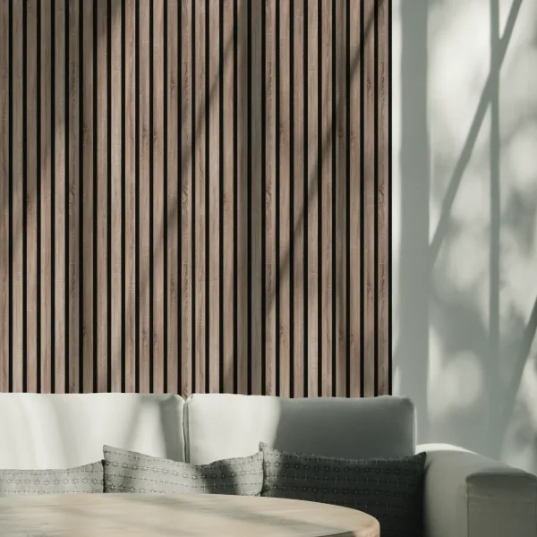 a wall with vintage oak acoustic panels and a sofa
